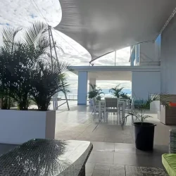 Imagen que muestra el panorama de la ciudad al atardecer con el edificio Gouppers