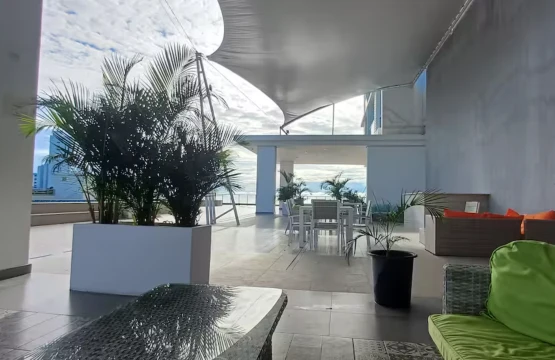 Imagen que muestra el panorama de la ciudad al atardecer con el edificio Gouppers