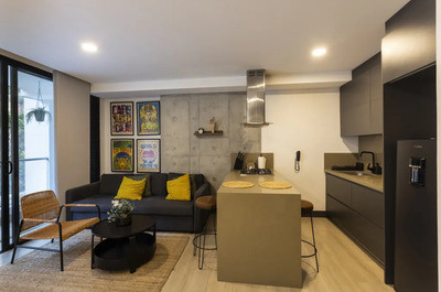 Compact Open-Plan Kitchen and Living Room with Island Seating — Gouppers